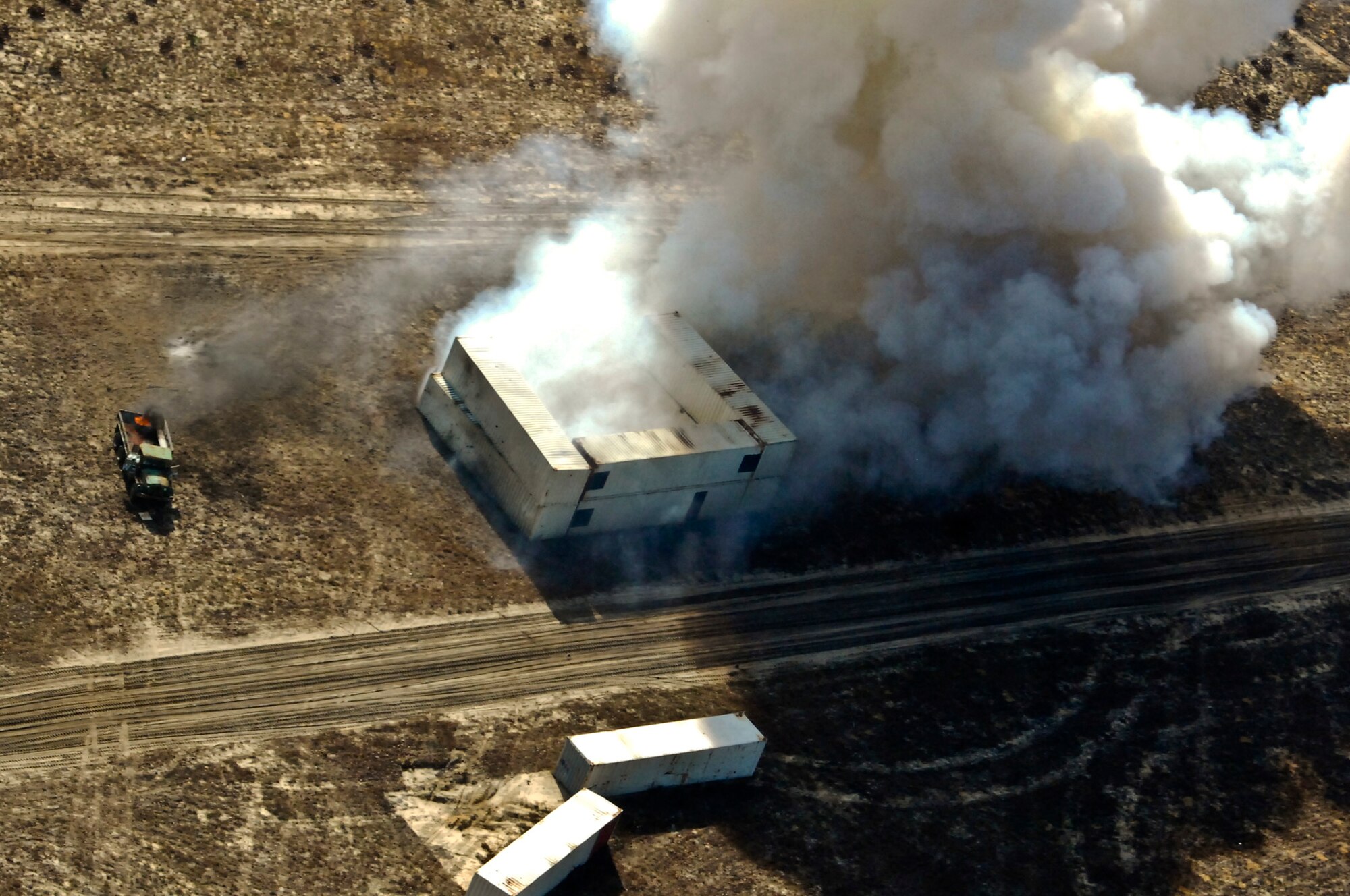 Smoke rises from a targeted site after an A-10 Thunderbolt II, from the 104th Fighter Squadron, dropped a bomb on the Eglin Air Force Base, Fla., range during a Combat Hammer mission last month. Combat Hammer is a weapons system evaluation program managed by the 86th Fighter Weapons Squadron. The Combat Hammer (air to ground) and Archer (air to air) programs are missions of the 53rd Wing. (Courtesy photo)