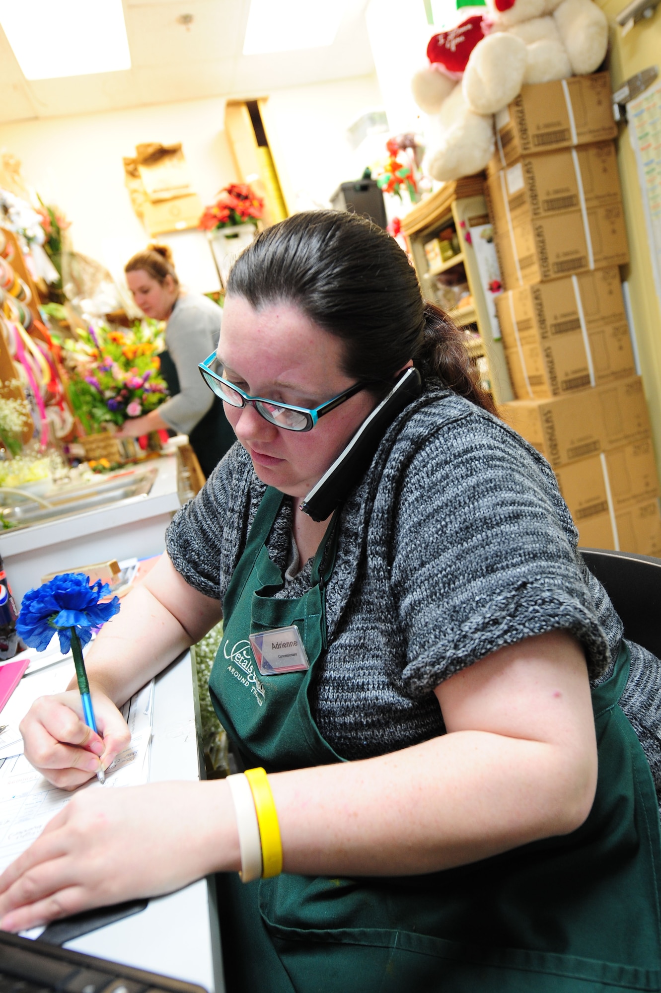 Adrienne Dawley takes a customer’s Valentine’s Day order over the phone at the Seymour Johnson Flower Shop in the Xchange on Seymour Johnson Air Force Base, N.C., Feb. 8, 2012. The flowershop is currently taking advance orders for Valentine’s Day until Friday, Feb. 10. Customers who don’t place an early order can pick up a premade arrangement until Feb. 14. Dawley has been a floral designer for four years and hails from Goldsboro, N.C. (U.S. Air Force photo/Airman 1st Class Mariah Tolbert/Released)
