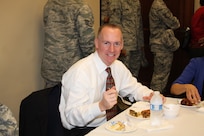 Todd Fore, Air Force Personnel Center executive director, partakes in some of the delicacies at the Joint Base San Antonio-Randolph African American Heritage Committee 2nd Annual Soul Food Taste, at the JBSA-Randolph Community Center Feb, 3. Any donations made to the event were provided to the Joint Base San Antonio-Fort Sam Houston Fisher House.  
(Courtesy photo)