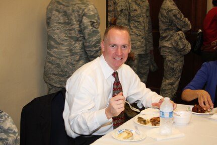 Todd Fore, Air Force Personnel Center executive director, partakes in some of the delicacies at the Joint Base San Antonio-Randolph African American Heritage Committee 2nd Annual Soul Food Taste, at the JBSA-Randolph Community Center Feb, 3. Any donations made to the event were provided to the Joint Base San Antonio-Fort Sam Houston Fisher House.  
(Courtesy photo)