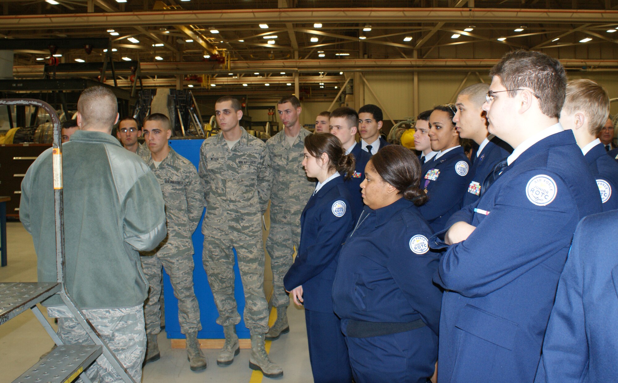 Cadets from the Wylie East High School Junior Reserve Officer Training Corps (JROTC ) learn about jet propulsion training at the 361st Training Squadron during their tour of Sheppard AFB Feb. 8, 2012. After a video presentation about the base and a welcome from a panel of active-duty Airmen, the 90 cadets and two tour buses visited both operational units and technical training destinations. (U.S. Air Force photo/Dan Hawkins)