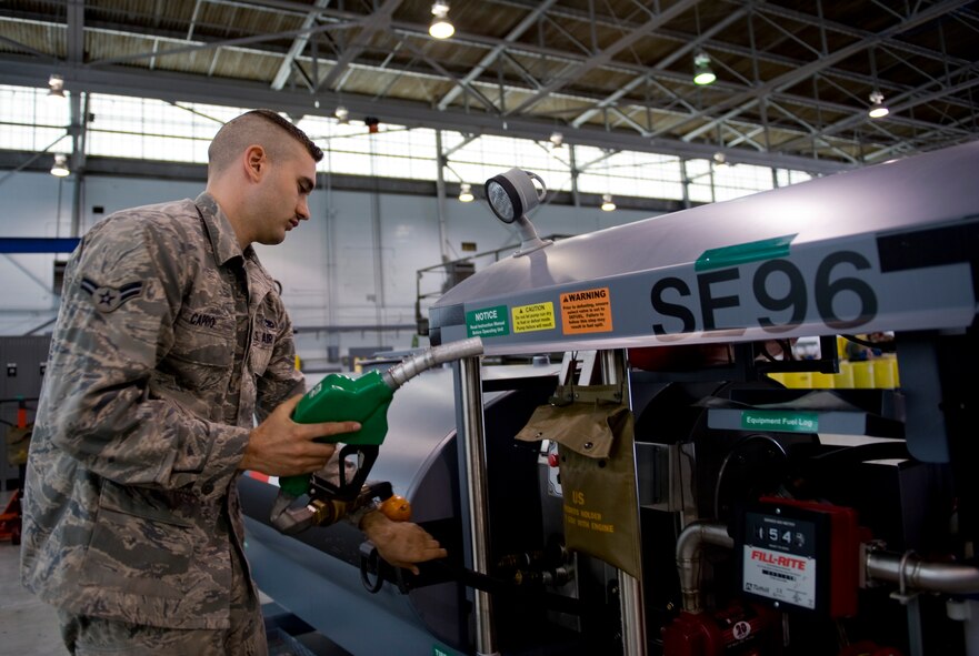 Airman 1st Class Andrew Caprio, 2nd Maintenance Squadron Aerospace Ground Equipment Flight, takes out a gas pump from a refueler on Barksdale Air Force Base, La., Feb. 7. The refueler is used to refuel an aircraft or piece of equipment on the spot to avoid mission interruption. It saves more than 472 man hours annually. (U.S. Air Force photo/Airman 1st Class Benjamin Gonsier)(RELEASED)