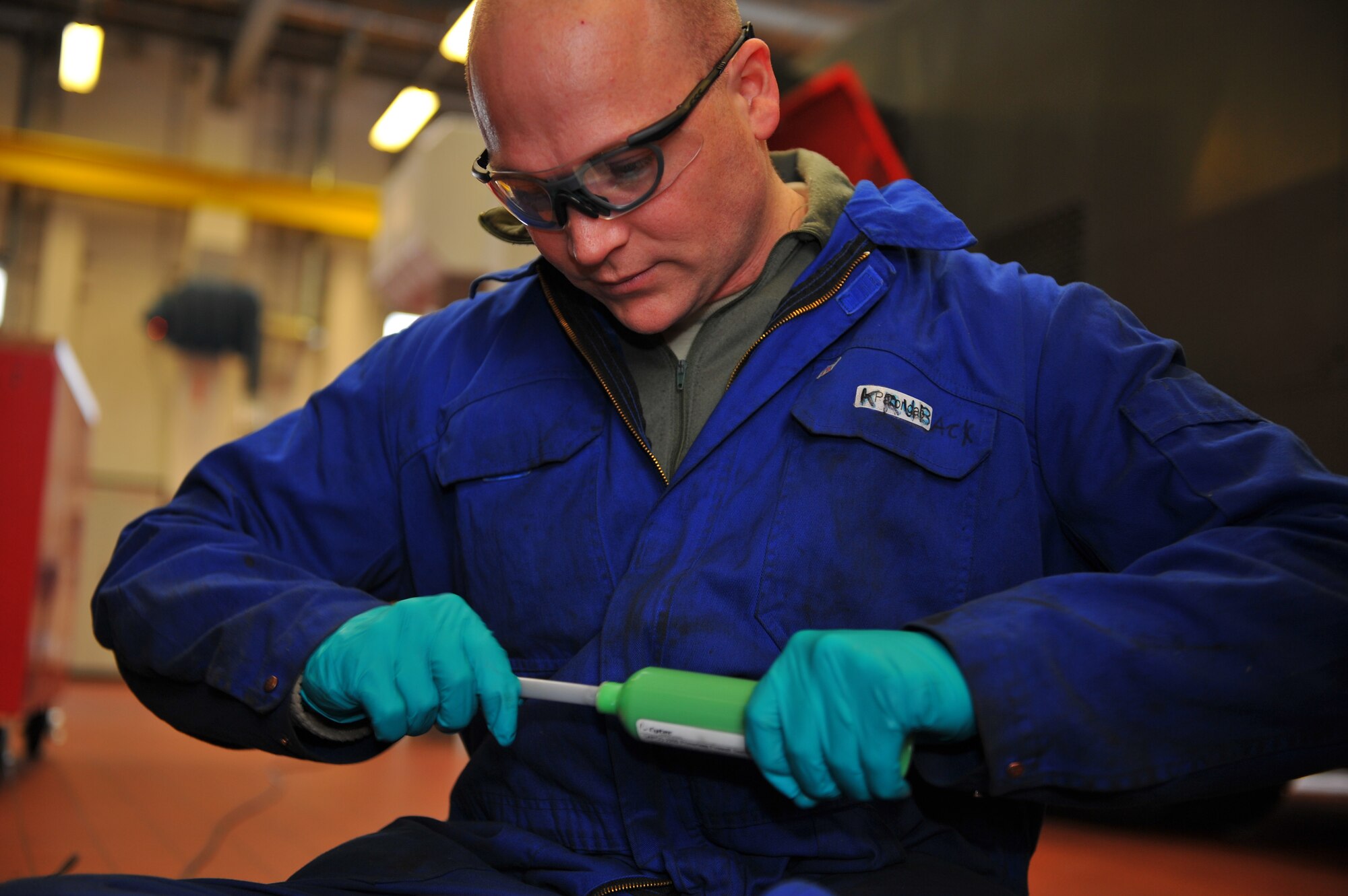 SPANGDAHLEM AIR BASE, Germany – Staff Sgt. Roger Kruback, 52nd Logistics Readiness Squadron vehicle maintenance technician, mixes high-temperature gasket sealant before it can be applied to the surface of a transfer case block during a transfer case rebuild on a P26 Tanker Truck inside the fire truck maintenance shop here Feb. 8. The transfer case is essential to the operation of the P26 Tanker Truck because it’s the gear box that transfers power from the transmission to the front and rear wheels enabling the truck to drive in extreme weather conditions.The fire truck maintenance shop consists of 12 technicians and is responsible for the maintenance of more than 50 heavy equipment vehicles such as fire trucks, aircraft deicers and aircraft load equipment. Technicians assigned to the fire truck maintenance shop ensure daily operations continue even when fire or ice present potential hindrances. (U.S. Air Force photo by Airman 1st Class Dillon Davis/Released)