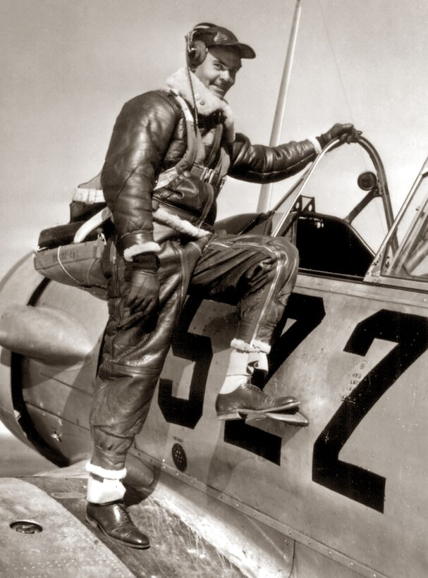 Capt. Benjamin O. Davis Jr., climbing into an Advanced Trainer at Tuskegee, Ala. in January 1942.  United States National Archives and Records Administration photo.