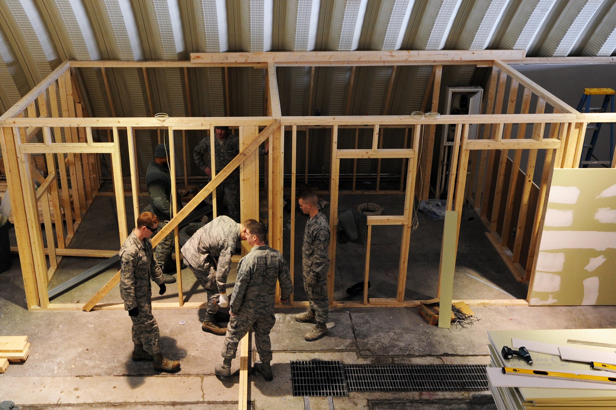 MISAWA AIR BASE, Japan -- Members of the 35th Civil Engineer Squadron renovate Building 1366 here, Feb. 8. Bldg. 1366 will be the new location for a stray animal temporary care facility that will be operated by PAWS. PAWS is a private organization that helps take care of animals. (U.S. Air Force Photo/Airman 1st Class Kia Atkins)