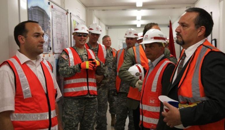 WIESBADEN, Germany — Bryce Jones, a U.S. Army Corps of Engineers Europe District civil engineer and mission command center team leader, discusses the on-time, on-budget U.S. Army Europe project with USACE senior leadership.