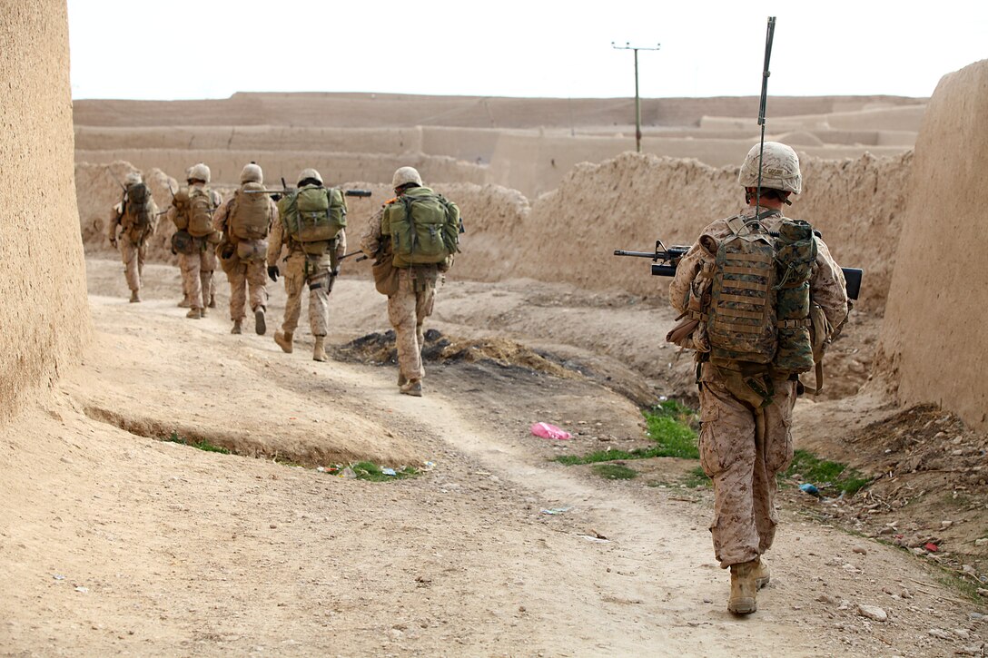The Marines of 2nd Battalion, 4th Marines patrol the the city of Shah Karez during Operation Alekhine’s Gun, a heliborne and motorized raid into an area known for corruption and enemy occupation, Feb. 10.