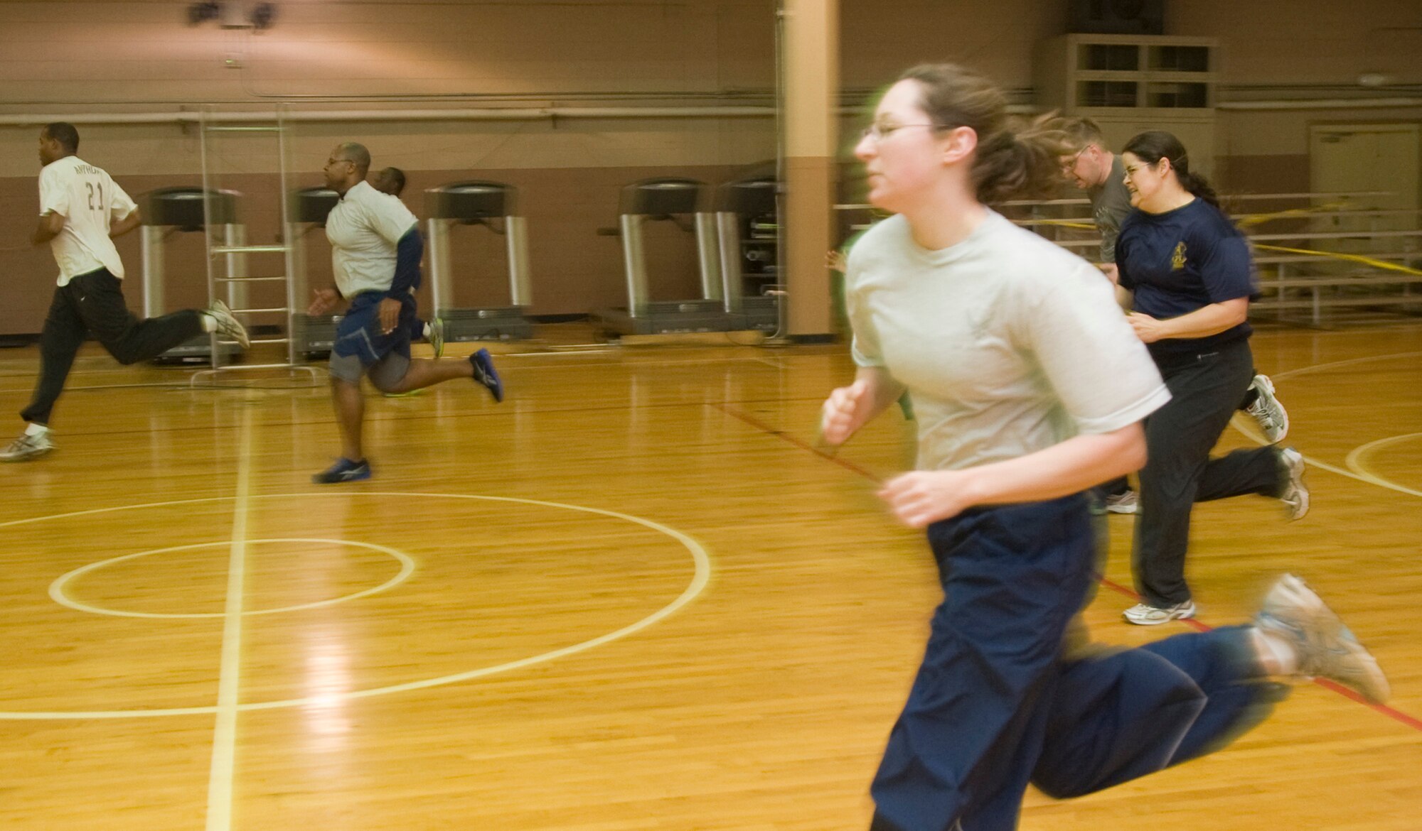 Airmen practice running sprints during the Run Improvement Program on Barksdale Air Force Base, La., Feb. 10. RIP was developed by Leah Beckham, 2nd Medical Operations Squadron Health and Wellness Center health and fitness specialist, to help improve people's fitness by focusing on safe training techniques over quick fix training programs. (U.S. Air Force photo/Senior Airman Kristin High)(RELEASED)