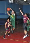 Rattlers guard Aaron Young goes airborne for a layup during Southwest Collegiate Institute for the Deaf’s 73-54 loss to Cryptologic Systems Division Saturday. (U.S. Air Force photo/Alan Boedeker)