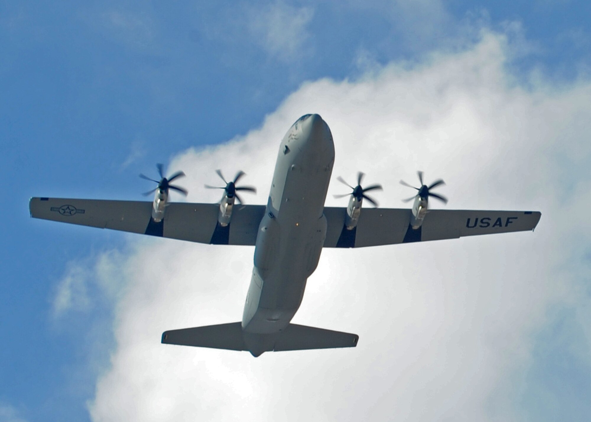 Delivery of a new C-130 J-model flies into Dyess Air Force Base, Texas, Feb. 9, 2012. The new J-model was delivered by Maj. Gen. Frederick H. Martin, Air Mobility Command director of operations. The aircraft is 14th of 28 J-models to be delivered to Dyess by 2013 and the first for the 39th Airlift Squadron. (U.S. Air Force photo by Airman 1st Class Peter Thompson/Released)
