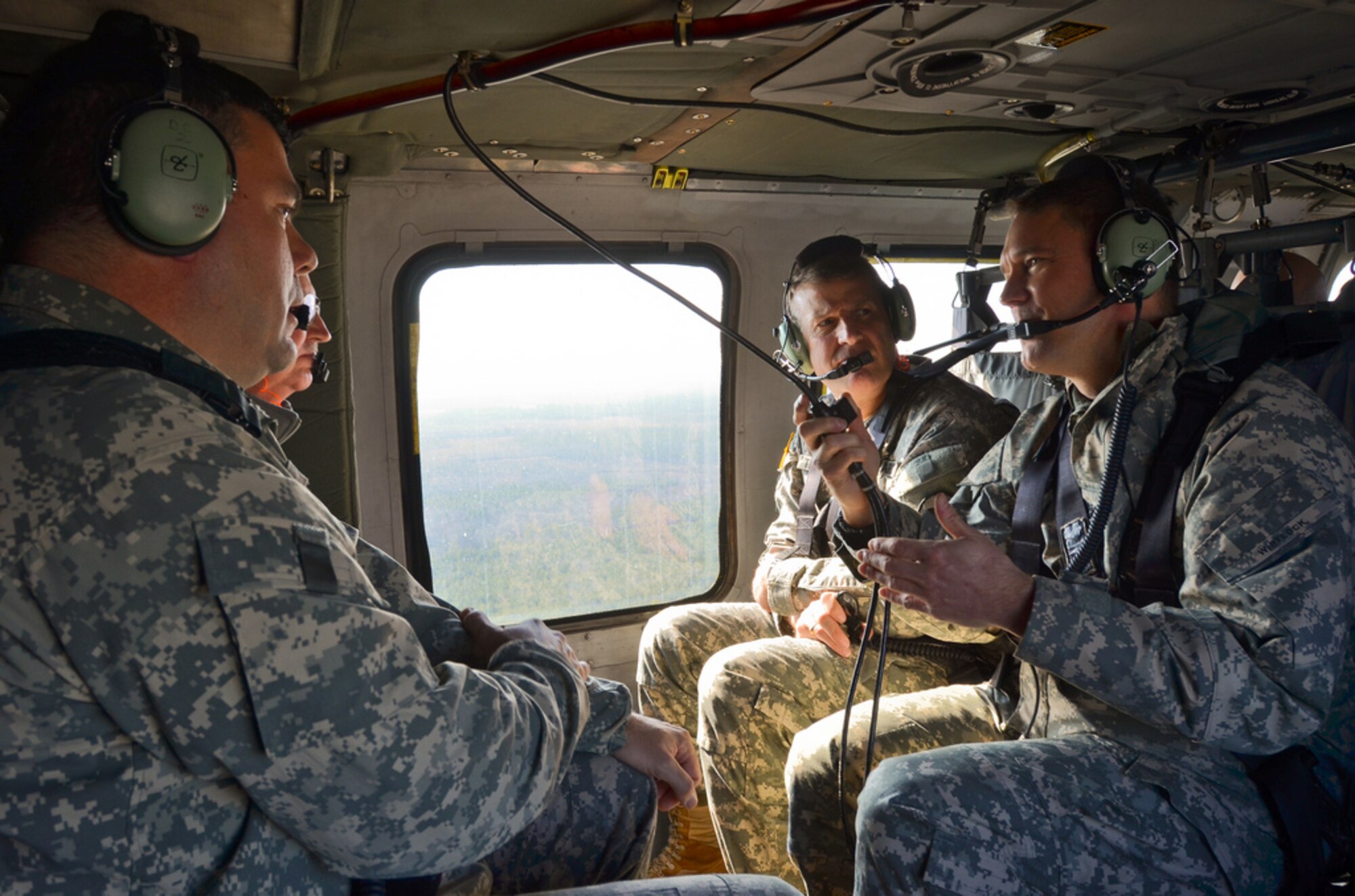 Maj. Gen. William D. Razz Waff, commanding general, 99th Regional Support
Command (back left); Maj. Gen. Keith J. Thurgood, deputy commanding general
(support)/chief of staff of the U.S. Army Reserve (back right); Col. Patrick
Slowey, commander, Army Support Activity-Dix (front left); and Col. Joseph
E. Whitlock, deputy commander, Joint Base McGuire-Dix-Lakehurst (front
right) conducts an aerial tour of Joint Base McGuire-Dix-Lakehurst during MG
Thurgood visit to the 99th Regional Support Command on Feb 7-8. (U.S. Army
Photo by - Sgt. 1st Class Alyn-Michael Macleod/Released)
