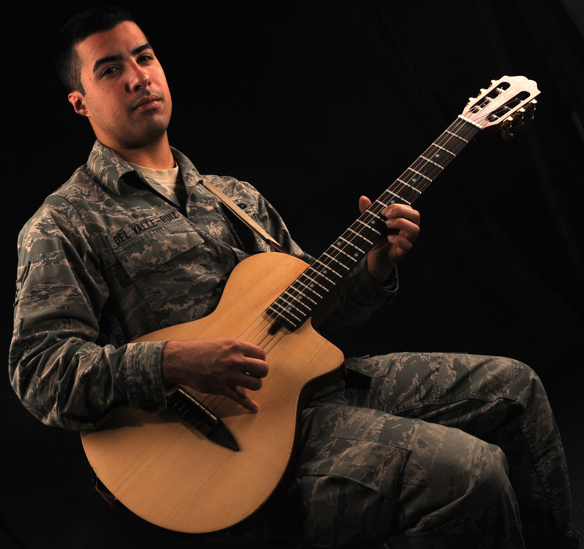 U.S. Air Force Airman 1st Class Kenneth Del Valle-Ruiz, 1st Maintenance Operations Squadron maintenance scheduler, was selected for Tops in Blue on Feb. 1, 2012. Del Valle-Ruiz will attend a six-week training course at Lackland Air Force Base, Texas, before touring the world with the Air Force's Expeditionary Entertainment Unit.  (U.S. Air Force photo by Airman 1st Class Teresa Cleveland/Released)