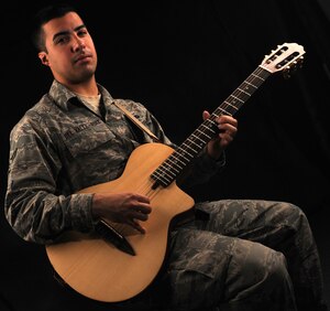 U.S. Air Force Airman 1st Class Kenneth Del Valle-Ruiz, 1st Maintenance Operations Squadron maintenance scheduler, was selected for Tops in Blue on Feb. 1, 2012. Del Valle-Ruiz will attend a six-week training course at Lackland Air Force Base, Texas, before touring the world with the Air Force's Expeditionary Entertainment Unit.  (U.S. Air Force photo by Airman 1st Class Teresa Cleveland/Released)