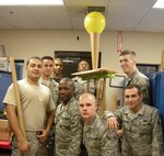 Airmen from the 916th Aircraft Maintenance Propulsion Flight work together as part of a Wingman Day scenario to complete a cone tower during the February drill weekend. (USAF photo courtesy of 916MXS)