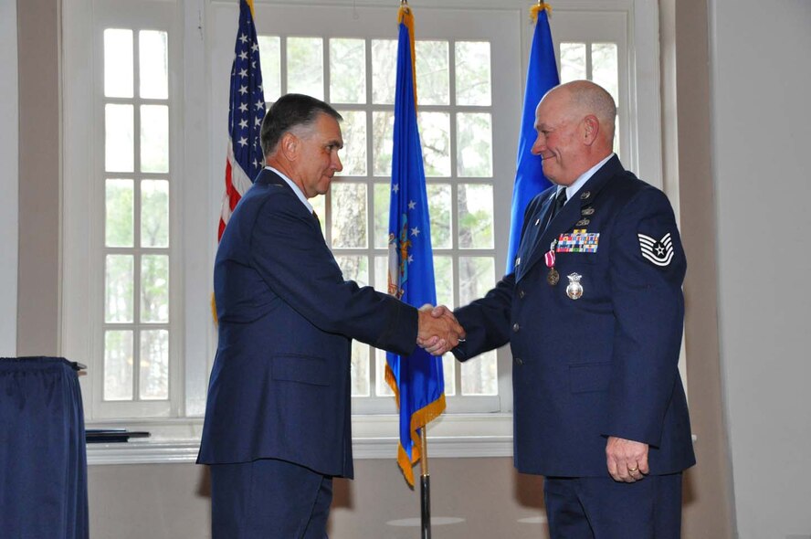 Tech. Sgt. Thomas Welch (right) retires during a ceremony on the February drill weekend. Sgt. Welch's cousin, Brig. Gen. William Welch, presided over the ceremony . (USAF MSgt. Wendy Lopedote, 916ARW/PA)