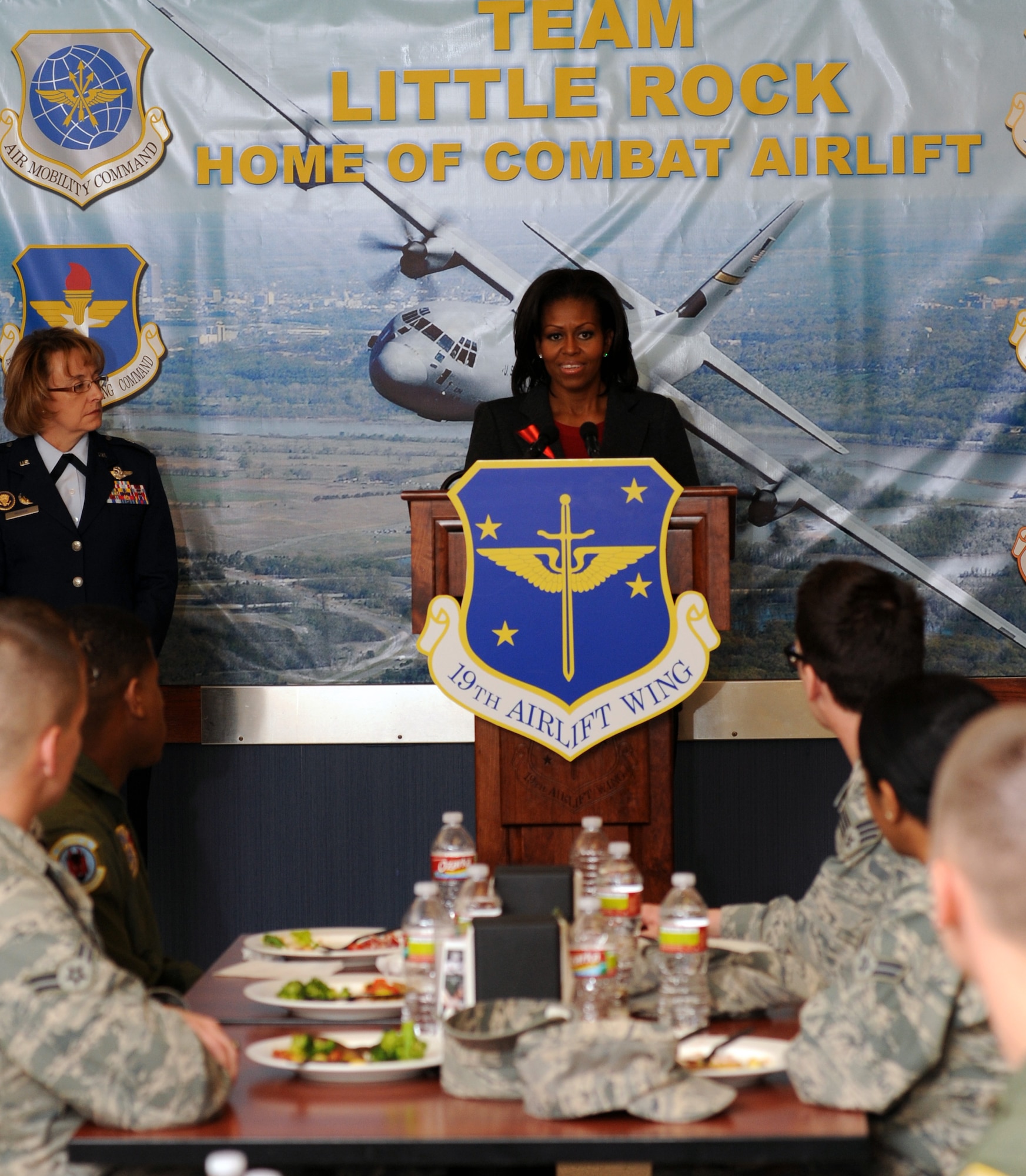 Michelle Obama speaks about the Food Transformation Initiative to Airmen at Little Rock Air Force Base, Ark., Feb. 9, 2012.  The FTI, which was implemented at the base almost 16 months ago, provides a wider variety of nutritional foods to service members and their families. (U.S. Air Force photo/Airman 1st Class Rusty Frank)