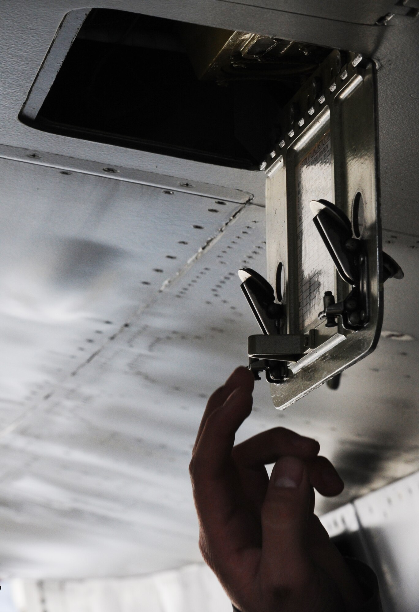 MISAWA AIR BASE, Japan – Airman 1st Class Mark Ward, 14th Aircraft Maintenance Unit crew chief, checks hydraulic pressure gages on an F-16 Fighting Falcon during a systems check here, Jan. 24. This process is necessary to ensure pilots and their aircraft launch and return safely after every mission. (U.S. Air Force photo/Airman Kenna Jackson)