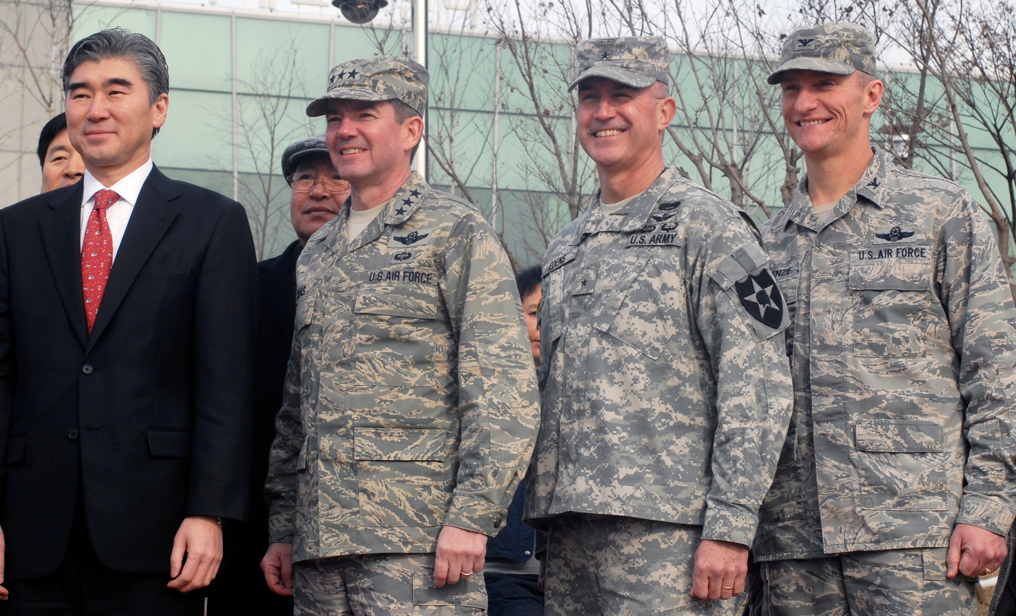U.S. Ambassador to the Republic of Korea Sung Kim, stands with U.S. military leaders at the Songtan International Community Center Feb.9, 2012. The ambassador gave a donation of 411 books and 244 DVDs to the community center, which will offer information and referral service, cultural exchange events, and educational programs to teach about other cultures and gain a better understanding of the growing number of foreigners in Korea. Photo left to right: U.S. Ambassador Kim; Lt. Gen. Jan-Marc Jouas, 7th Air Force commander; Brig. Gen. Timothy Edens, Assistant Division Commander for Support of Second Infantry Division; and Col. Patrick McKenzie, 51st Fighter Wing commander. (U.S. Air Force photo/Capt. Cody Chiles)