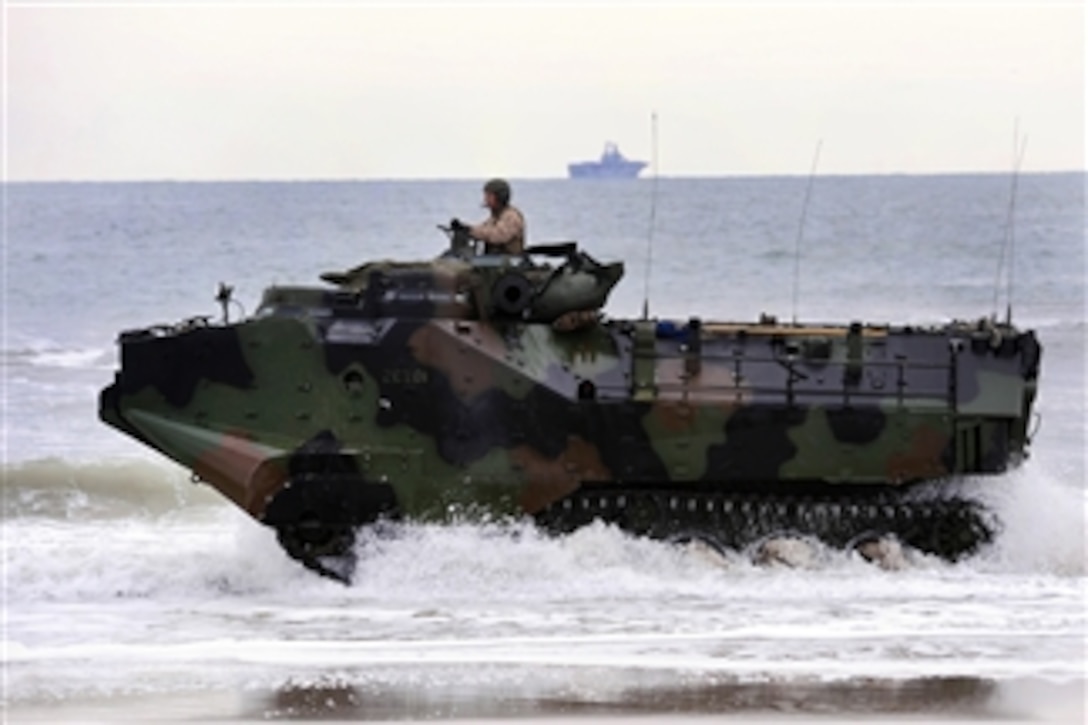 Marines drive amphibious assault vehicles along the shore during an amphibious assault exercise as part of Bold Alligator 2012 at Camp Lejeune, N.C., on Feb. 6, 2012.  