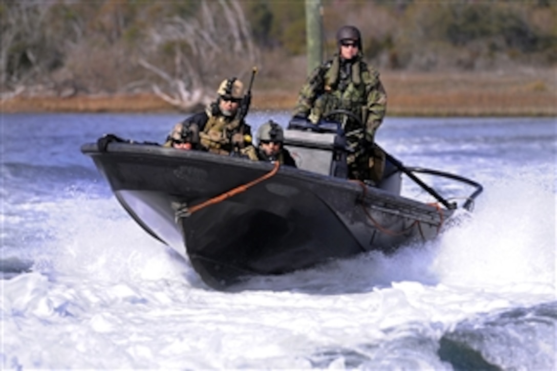 A Navy riverine security team prepares to land ashore during Bold Alligator 2012 at Camp Lejeune, N.C., on Feb. 7, 2012.  