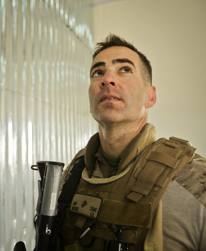 Major Erich Bergiel inspects the interior of the new Fruit and Vegetable Packing Facility located in Marjeh. Local farmers will now be able to keep their fresh produce in a controlled environment instead of the hot, Helmand province sun. The facility will help maintain higher quality produce and it will also act as a distribution center to reach additional markets, providing farmers additional income. 