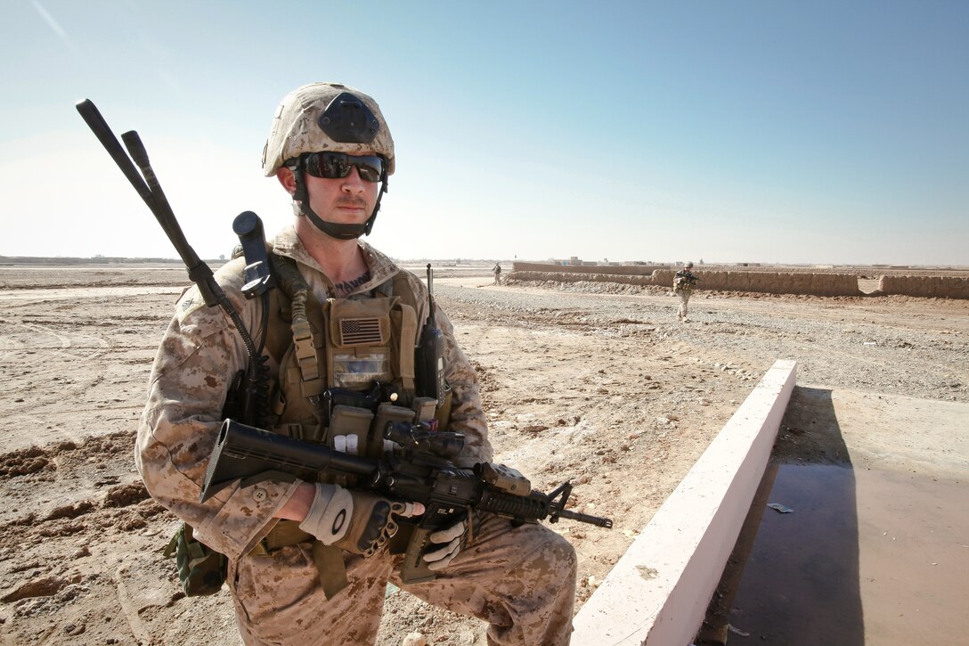 Sgt. John Wright, security patrol leader, led the patrol from Camp Hanson to the new Marjeh Fruit and Vegetable Packing Facility. Wright, from San Diego, Calif., is a member of the civil affairs team from 2nd Battalion, 11th Marine Regiment. 