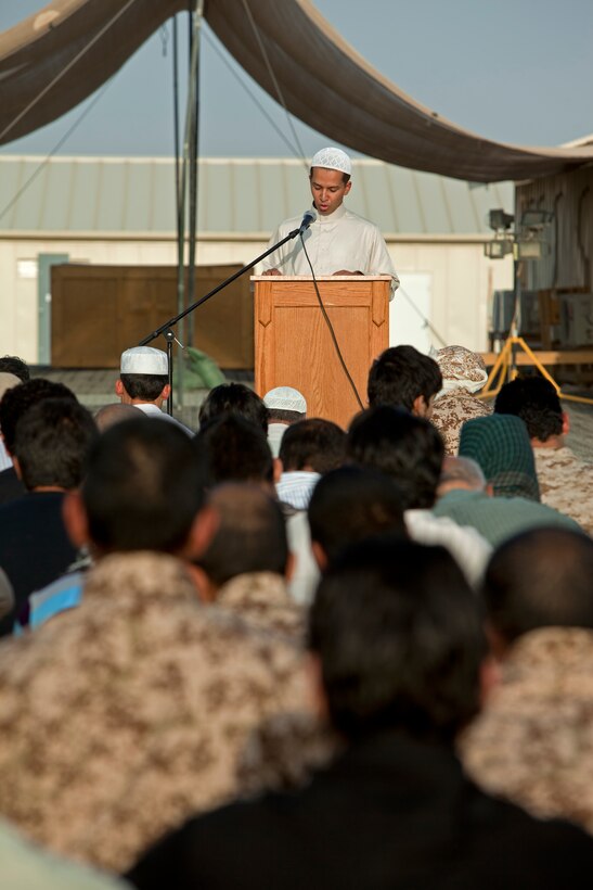 Lt. Asif Balbale, the battalion chaplain for Assault Amphibian School Battalion based out of Marine Corps Base Camp Pendleton, Calif., delivers a sermon during an Eid ul-Fitr ceremony aboard Camp Leatherneck, Helmand province, Aug. 30. Eid ul-Fitr, which marks the end of the month of Ramadan, was observed during a ceremony that included prayer and a sermon led by Balbale. 
