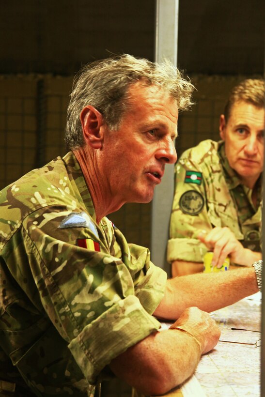 Lieutenant Gen. Sir Alexander Richard David Shirreff, the Deputy Supreme Allied Commander at NATO, discusses recent progress and future operations with commanders of British forces in Nadi’Ali South, Helmand province, September 5, 2011. Shirreff visited Regional Command Southwest, Sept. 5-6, to see what he can do on a strategic level at NATO to help coalition troops in Afghanistan.
