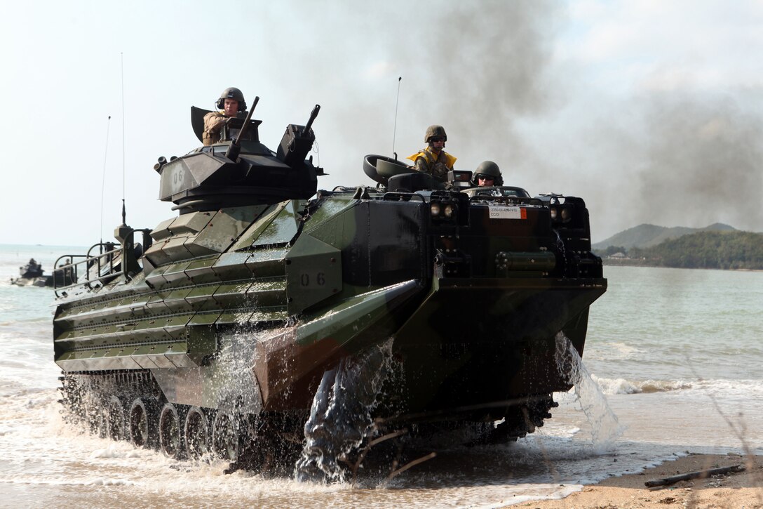 An amphibious assault vehicle with Company B., Battalion Landing Team 1st Battalion, 4th Marines, 31st Marine Expeditionary Unit, hits the beach during a mechanized raid here, Feb. 11. The U.S. Marines, alongside the Royal Thai Marines, suppressed and eliminated enemy role players which and secured the area. Cobra Gold 2012 demonstrates the resolve of the U.S. and participating nations to increase interoperability and promote security and peace throughout the Asia-Pacific region. The 31st MEU is the only continuously forward-deployed MEU and remains the nation’s force in readiness in the Asia-Pacific region.