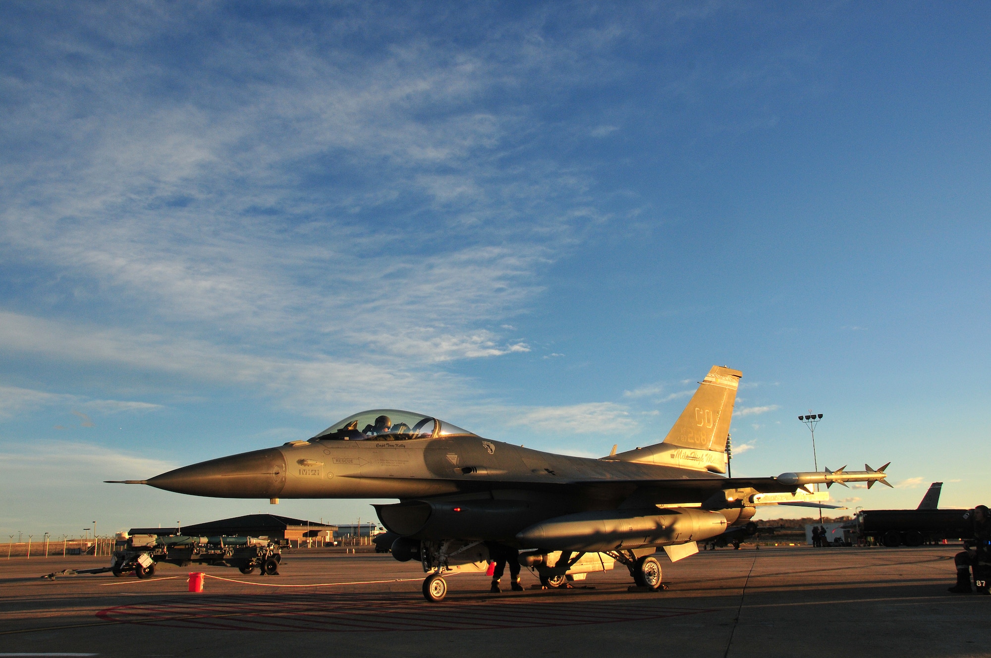 U.S. Air Force F-16 Fighting Falcon pilot from the 120th Fighter Wing, waits for ground crew members to finish their checks during the Operational Readiness Exercise at Buckley Air Force Base Colo., January 21, 2012. Buckley Air National Guard Airmen are taking part in the exercise to evaluate them with mission readiness in preparation for real world deployments as well the Operational Readiness Inspection being held in the spring.  (U.S. Air Force photo by Tech. Sgt. Wolfram M. Stumpf/RELEASED)