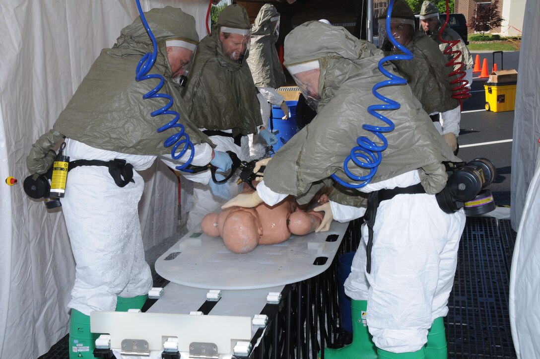 Member of the 134th ARW participate in a patient decontamination unit exercise on April 17, 2011.