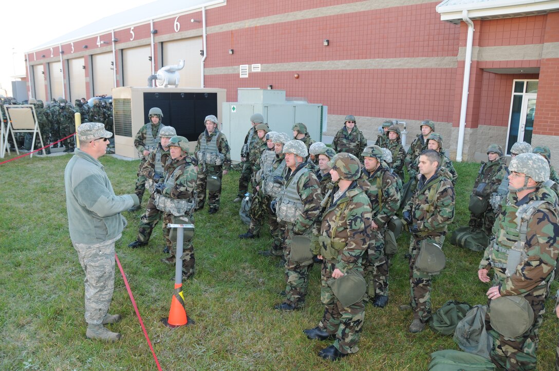 Members of the 134th ARW receive a briefing during an exercise at the Fire Department on November 6, 2011.