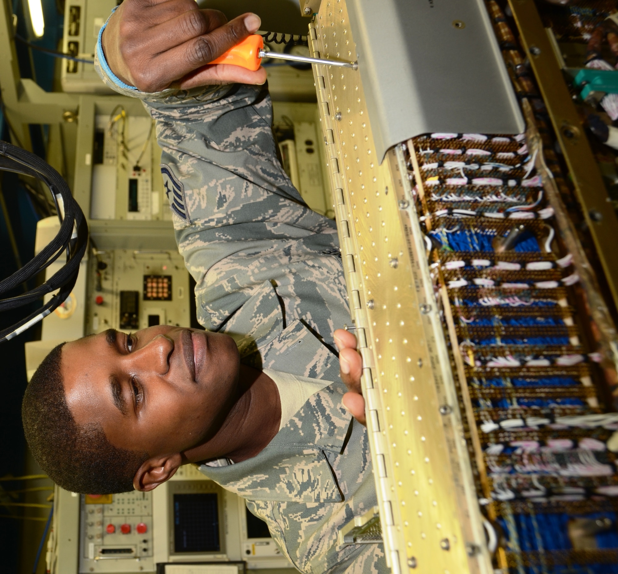 Staff Sgt. Ousseynou S. Sonko, an avionics sensors and electronic warfare systems mechanic in the 175th Maintenance Squadron, disassembles an electronic countermeasures pod. (National Guard photo by Master Sgt. Ed Bard)