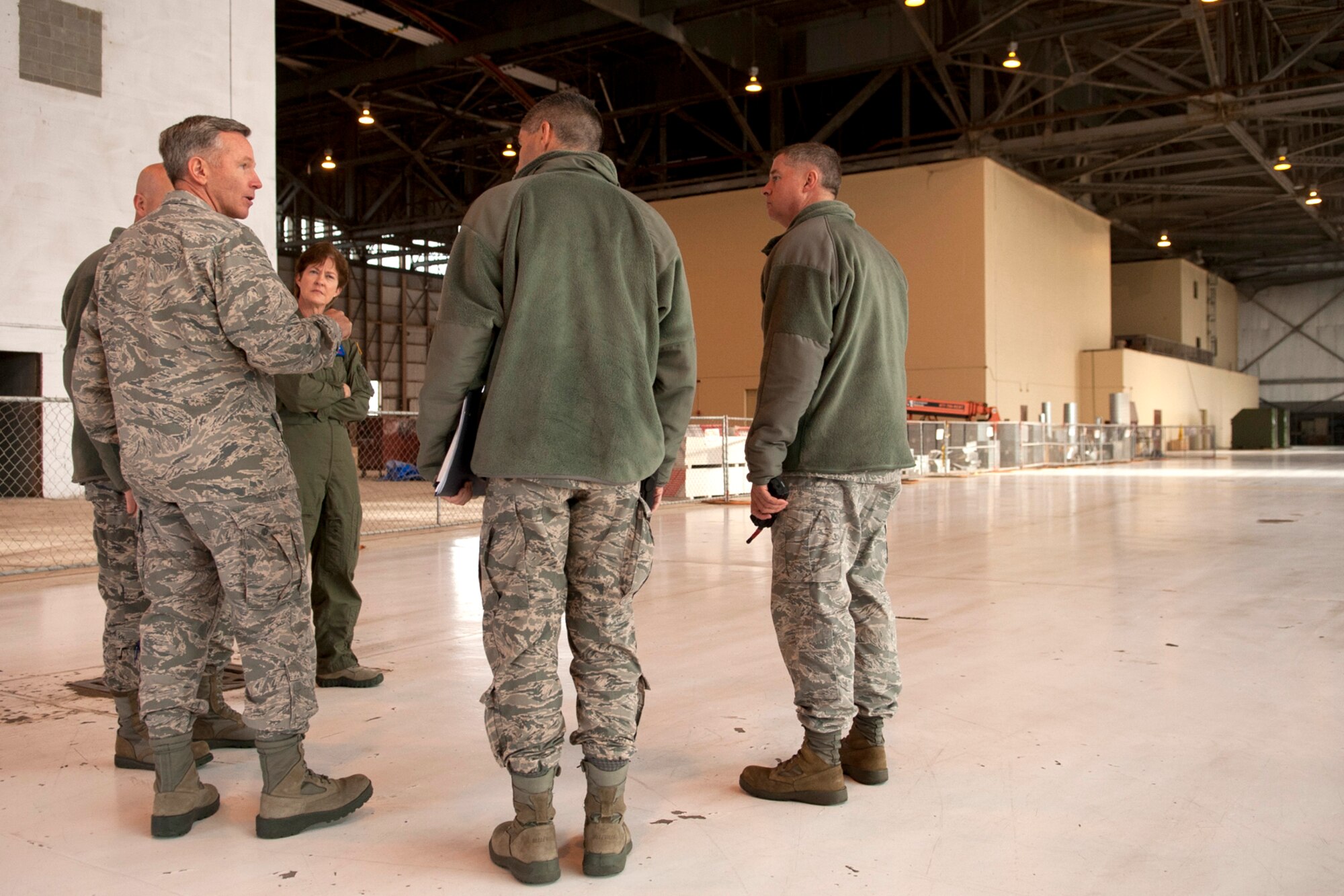 U.S. Air Force Brig. Gen. William Binger, 10th Air Force commander, talks with members of the 307th Aircraft Maintnenace Squadron about current renovations being made to their work facility, Barksdale Air Force Base, La., Feb. 10, 2012. Binger took command of 10th AF in Nov. 2011 and this was his first visit to the 307th Bomb Wing. (U.S. Air Force photo by Master Sgt. Greg Steele/Released)