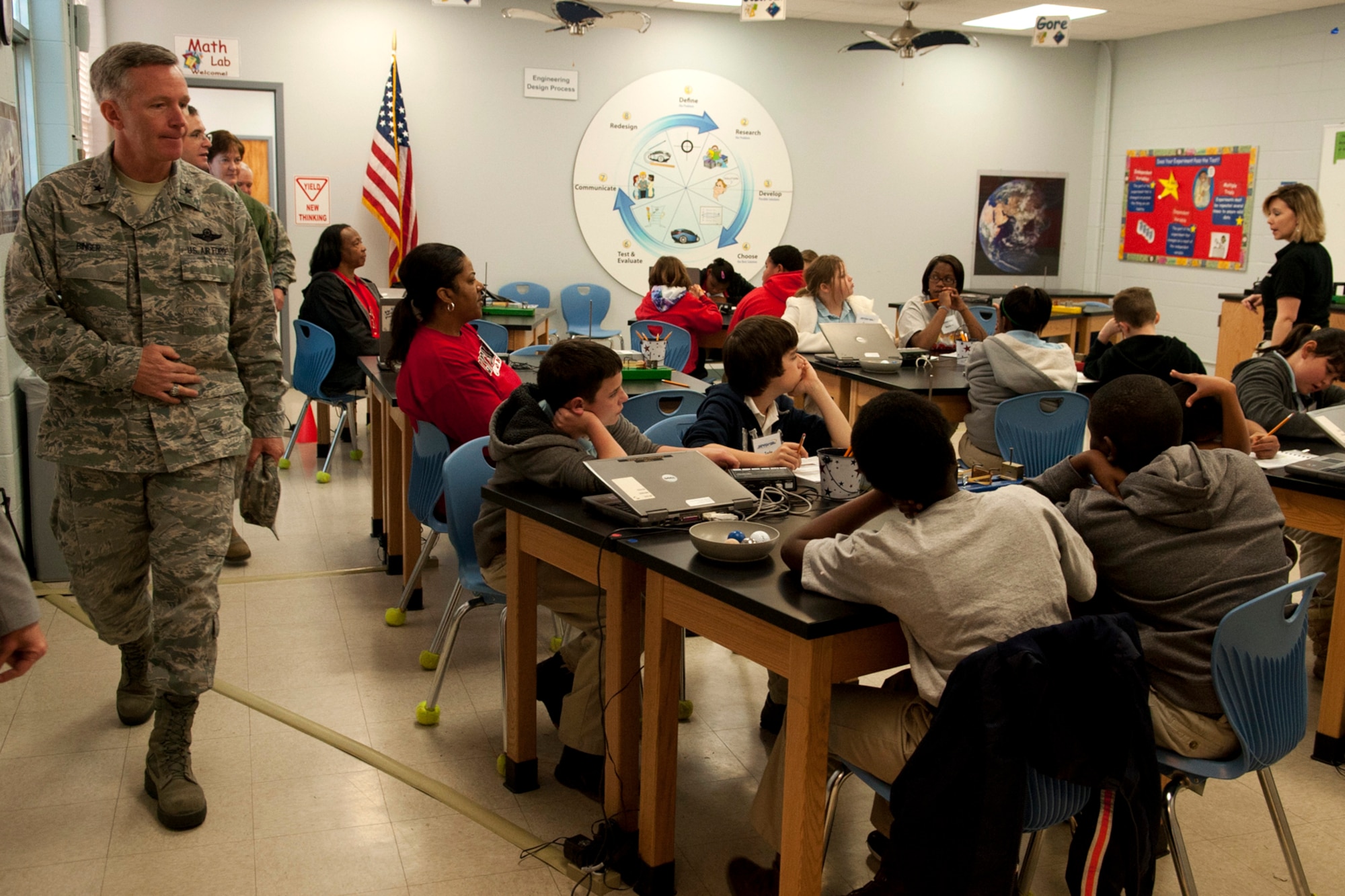 U.S. Air Force Brig. Gen. William Binger, 10th Air Force commander, tours STARBASE, Barksdale Air Force Base, La., Feb. 10, 2012. STARBASE students participate in challenging "hands-on, minds-on" activities in Science, Technology, Engineering and Math. (U..S. Air Force photo by Master Sgt. Greg Steele/Released)