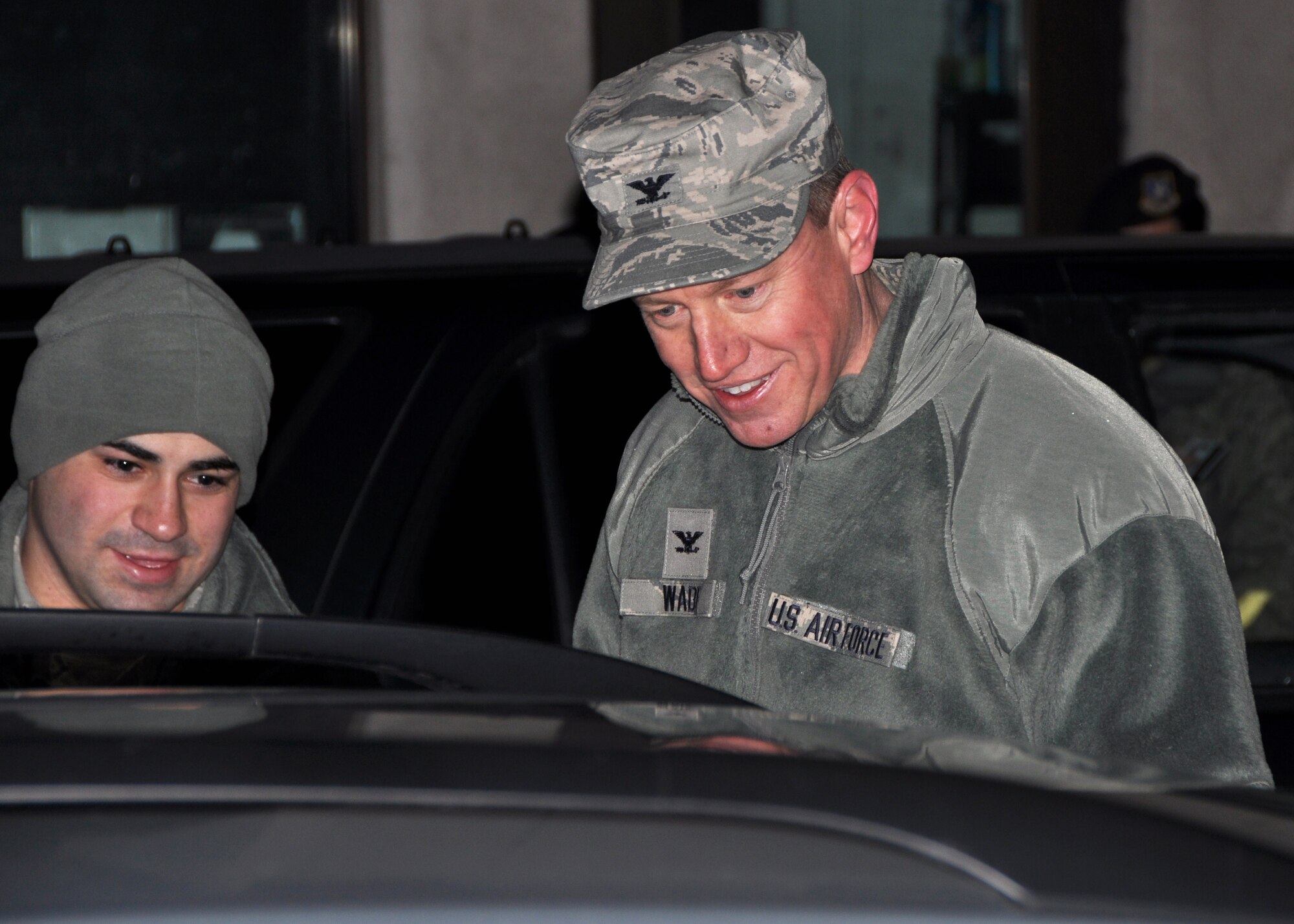 Col. Pat Wade, 419th Fighter Wing vice commander, greets a morning commuter at the base’s South Gate today with Airman 1st Class Omar Abuhudra from the 419th Security Forces Squadron. Wade took to the gate during the wing’s February UTA as an easy way to say hello to all 419th Airmen on their way in for duty and learn about base access procedures, first hand.  (U.S. Air Force photo/Tech Sgt. Richard Gonzales)