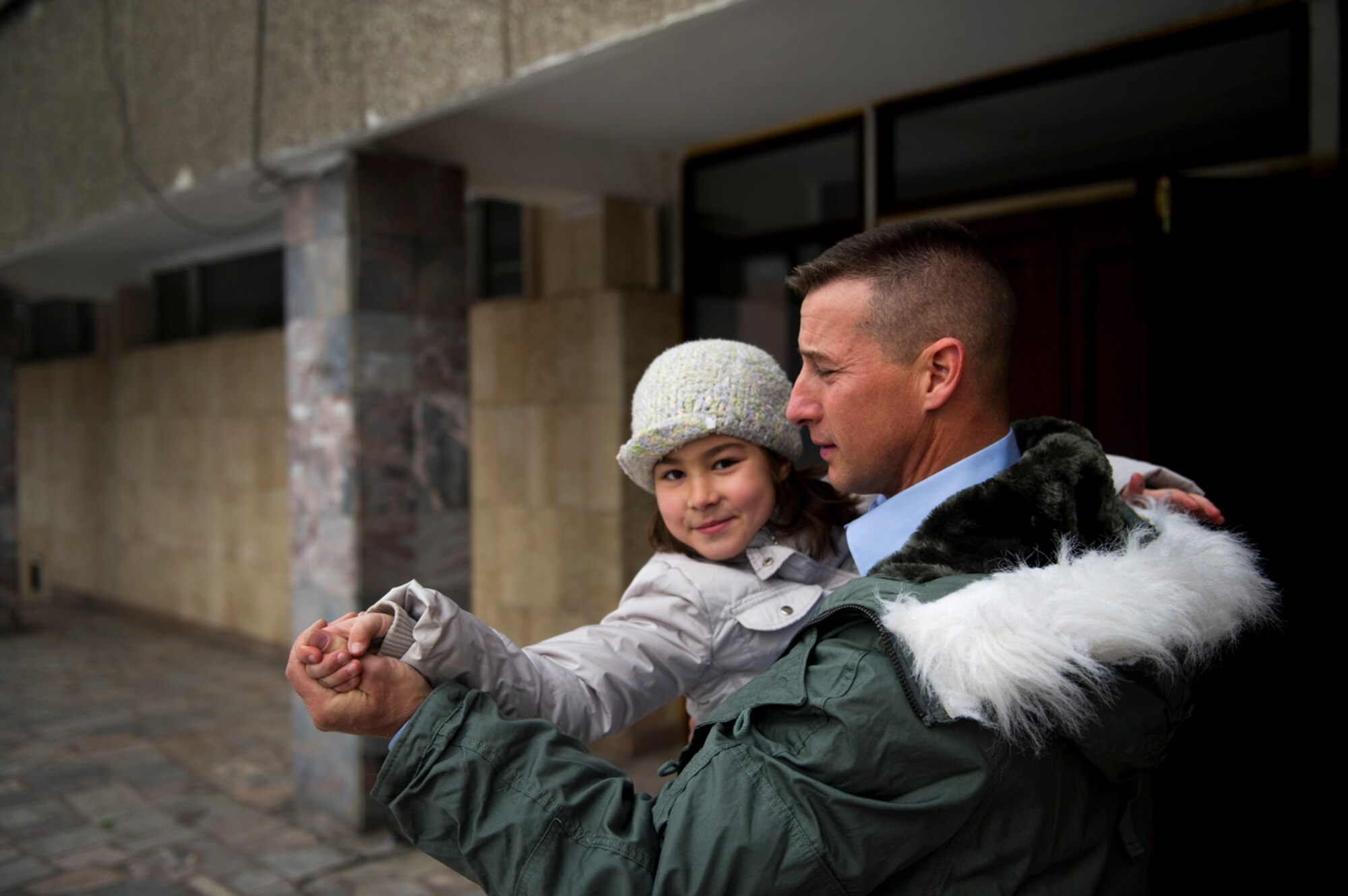 U.S. Air Force Master Sgt. Ted Stearns, NCO in charge of the U.S. Air Forces Central Band Afterburner, dances with a student at the Bishkek School of Choreography in Kyrgyzstan, Feb. 2012.  The band is currently touring local schools in celebration of the 20th Anniversary of friendship between the U.S. and Kyrgyzstan.  (U.S. Air Force photo by Staff Sgt. David Salanitri/Released)