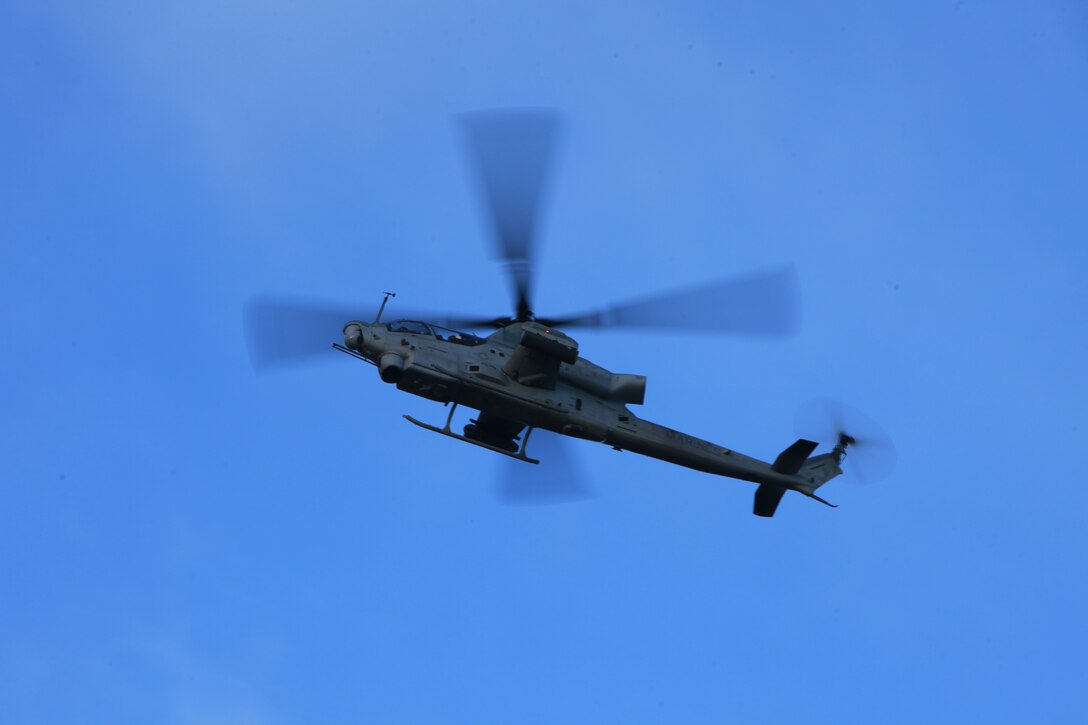 An AH-1Z flies overhead before providing close air support during a combined arms exercise with the Japanese Ground Self Defense Force, Feb. 12. The exercise included 81 and 120mm mortars, fixed and rotary wing assets and Naval gun fire.  In addition to the gunfire exercise, the Japanese also practiced calling for fire. Exercise Iron Fist 2012 is a bilateral training exercise that gave the 15th MEU a chance to demonstrate its amphibious capabilities to the Japanese.