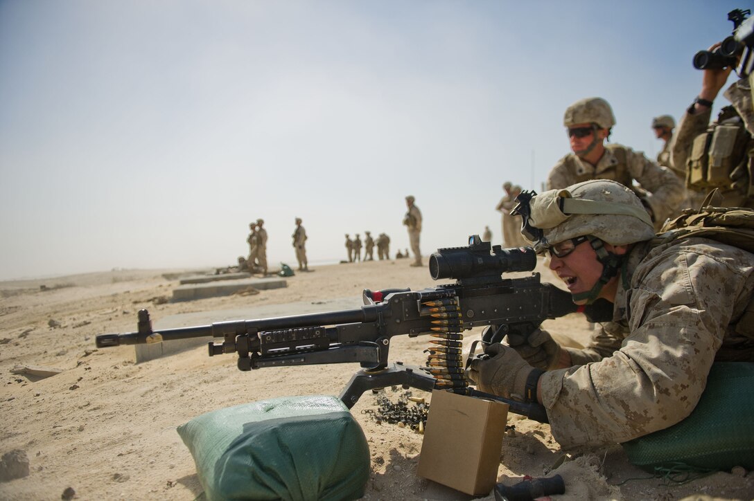 Machine gunner Lance Cpl. Charles B. Childers fires an M240B machine gun here Feb. 12 during field training. The 20-year-old Fort Smith, Ark., native serves with Battalion Landing Team 3/1, the ground combat element for the 11th Marine Expeditionary Unit. The unit is deployed as part of the Makin Island Amphibious Ready Group, a U.S. Central Command theater reserve force. The group is providing support for maritime security operations and theater security cooperation efforts here.