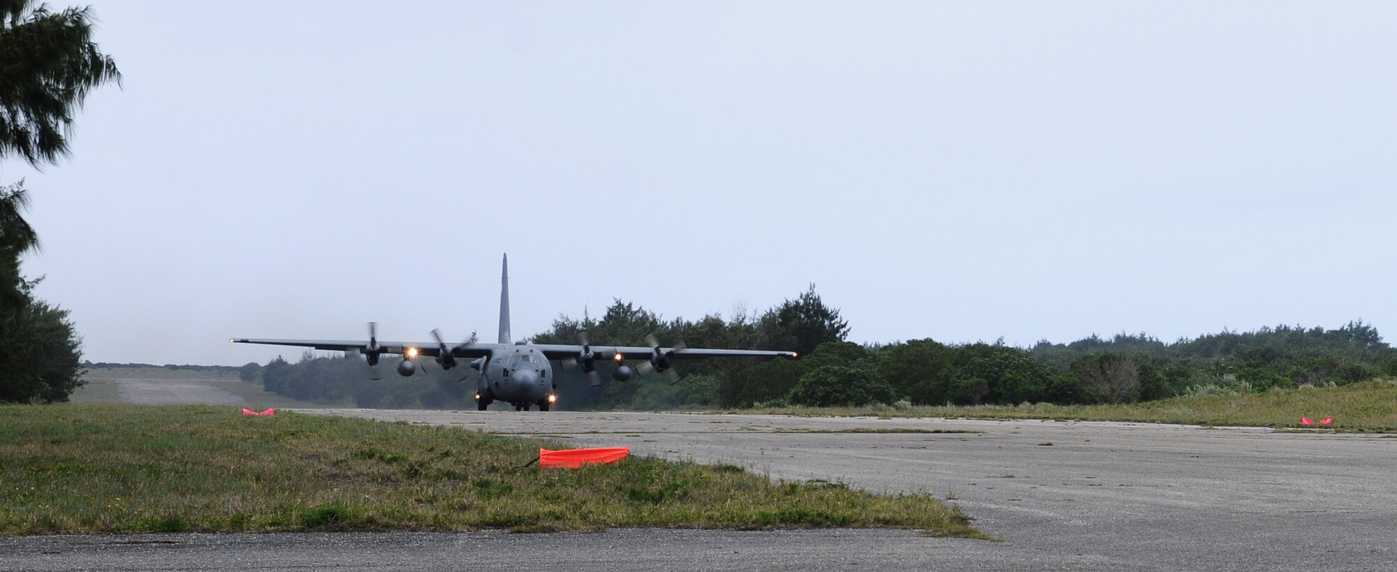 ANDERSEN AIR FORCE BASE, Guam- A C-130 from the 374th Airlift Wing, lands at Andersen North West Field in support of the Humanitarian Assistance Disaster Relief exercise, 13 Feb. The exercise will last for five days  and will have  the Royal Australian Air Force and the Japan Air Self Defense Force integration, allowing each force to see how the other works in this scenario.(U.S. Air Force photo/Senior Airman Carlin Leslie)