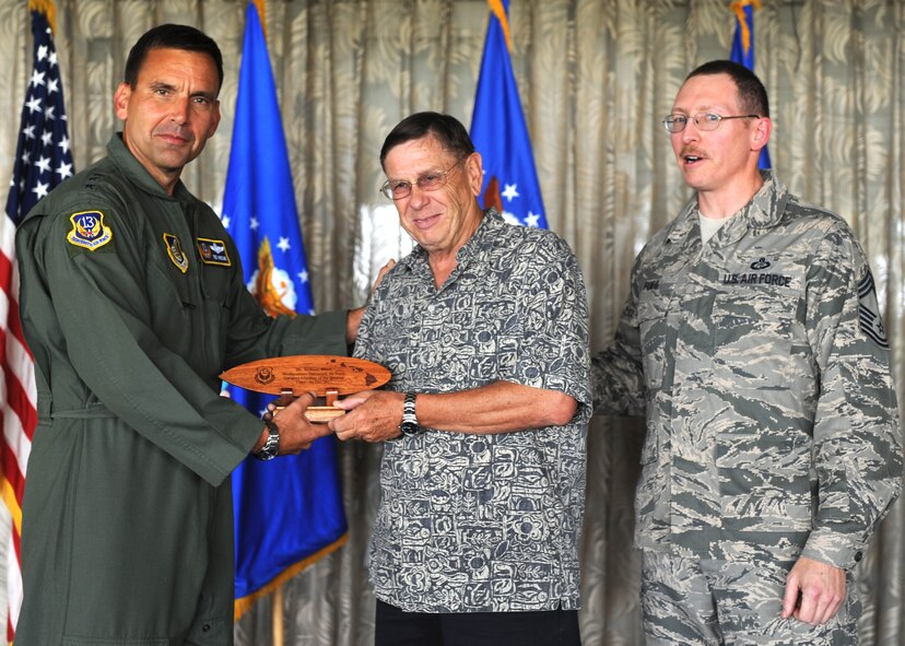 Lt. Gen. Ted Kresge, 13th Air Force Commander presents William Wood, a 13th Air Force team member, with an award at the Hickam Officer's Club on Joint Base Pearl Harbor-Hickam, February 10.