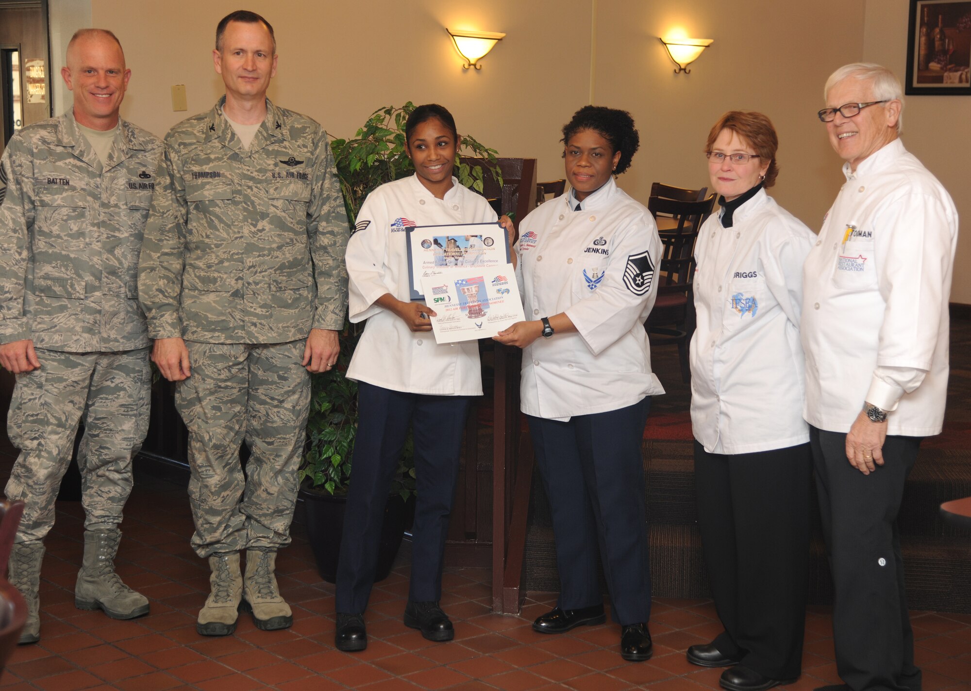 U.S. Air Force Senior Airman Tanica Case, 23d Force Support Squadron food services specialist, is presented the Top Performer Award at Moody Air Force Base, Ga., Feb. 11, 2012. Case will travel to Chicago to represent Moody in the Multi-Unit Operations category for the Hennessey Award in May. (U.S. Air Force photo by Airman 1st Class Paul Francis/Released)
