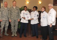 U.S. Air Force Senior Airman Tanica Case, 23d Force Support Squadron food services specialist, is presented the Top Performer Award at Moody Air Force Base, Ga., Feb. 11, 2012. Case will travel to Chicago to represent Moody in the Multi-Unit Operations category for the Hennessey Award in May. (U.S. Air Force photo by Airman 1st Class Paul Francis/Released)
