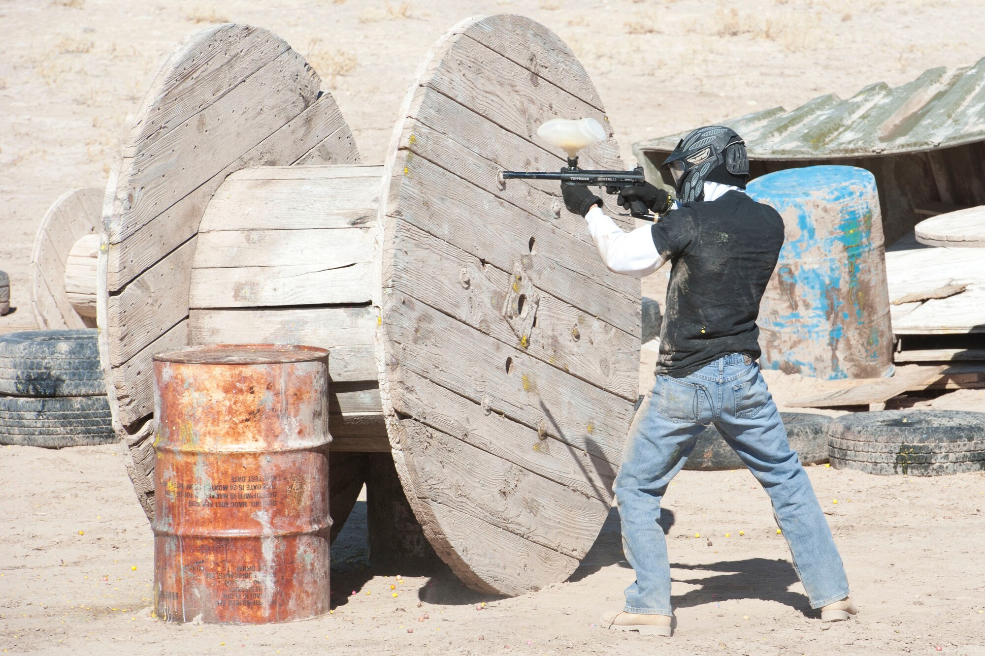 HOLLOMAN AIR FORCE BASE, N.M. – A resident of Holloman’s dormitories participates in an Outdoor Recreation Center paintball tournament at the paintball fields here Feb. 11. The tournament was in support of the Air Force’s Single Airmen Initiative program, which is designed to sponsor activities and programs to meet the needs and interests of the Airmen community, boost morale, and improve the quality of life for Holloman’s Airmen. (U.S. Air Force photo by Airman 1st Class Anthony M. Ward/Released)