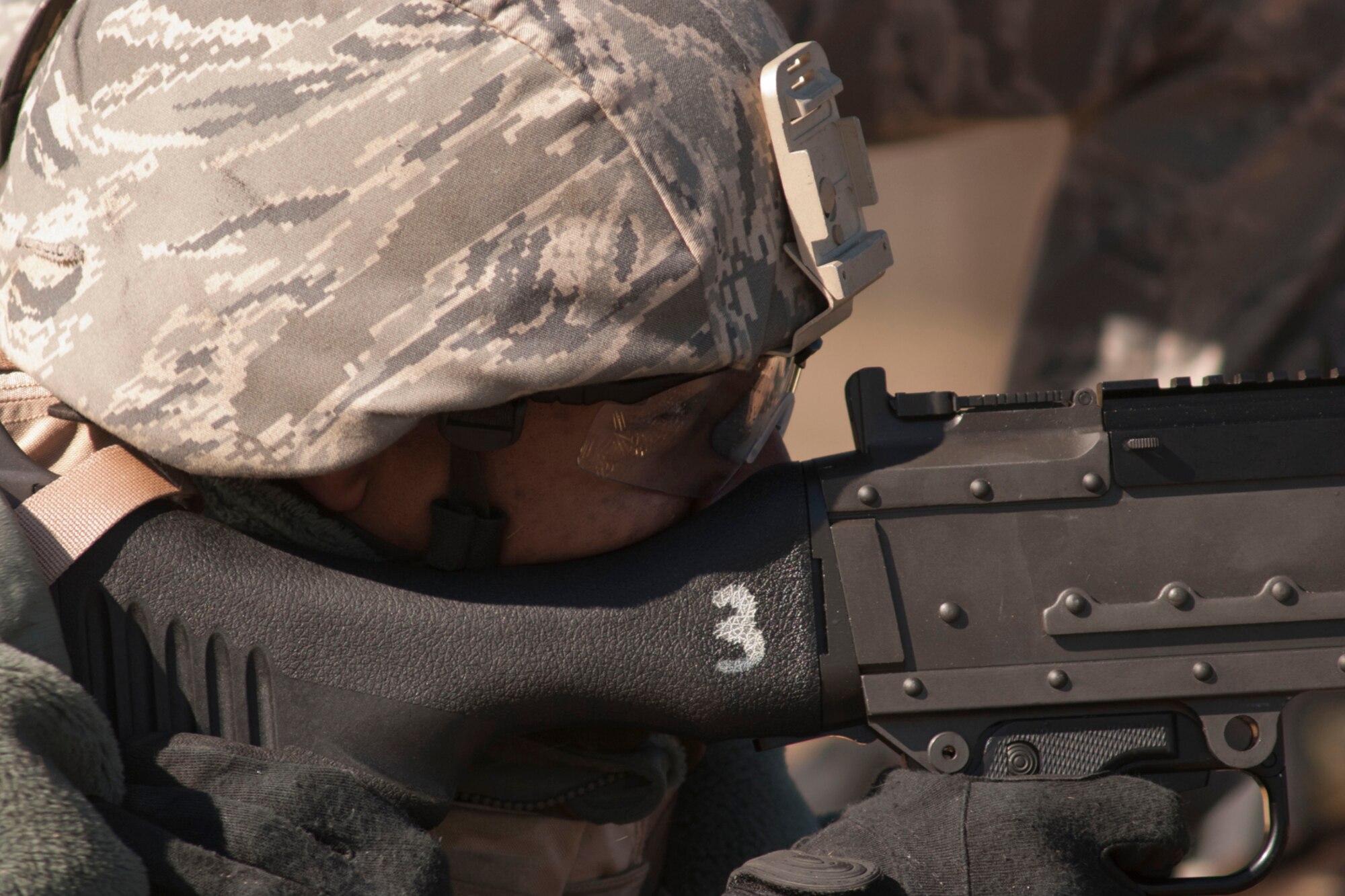 Airman 1st Class Stephen Boyd, 307th Security Forces Squadron journeyman, concentrates on targets downrange Feb. 11th, 2012 at Ft. Polk, La.  Boyd was part of a group of Airman to travel from Barksdale Air Force Base, La. for training on the weapons range at Ft. Polk.  The range at Ft. Polk provided the best training environment for qualifying with the M240 and M249 machine guns.  (U.S. Air Force photo by Staff Sgt. Ted Daigle/ Released)