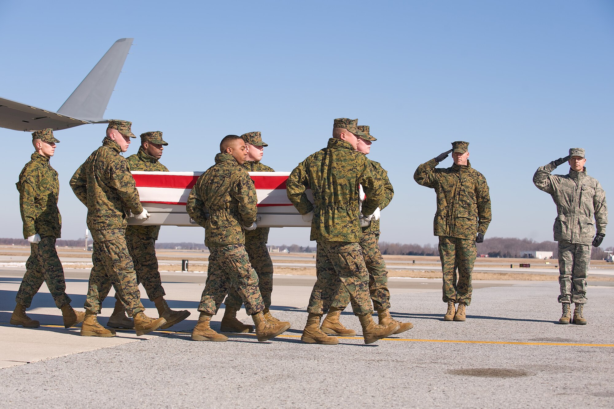 A U.S. Marine Corps carry team transfers the remains of Marine Lance Cpl. Osbrany Montesdeoca, of North Bergen, N.J., at Dover Air Force Base, Del., Feb. 13, 2012. Montesdeoca was assigned to the 2nd Battalion, 6th Marine regiment, Regimental Combat Team 5, 2nd Marine Division, II Marine Expeditionary Force, Camp Lejeune, N.C. (U.S. Air Force photo/Steve Kotecki)