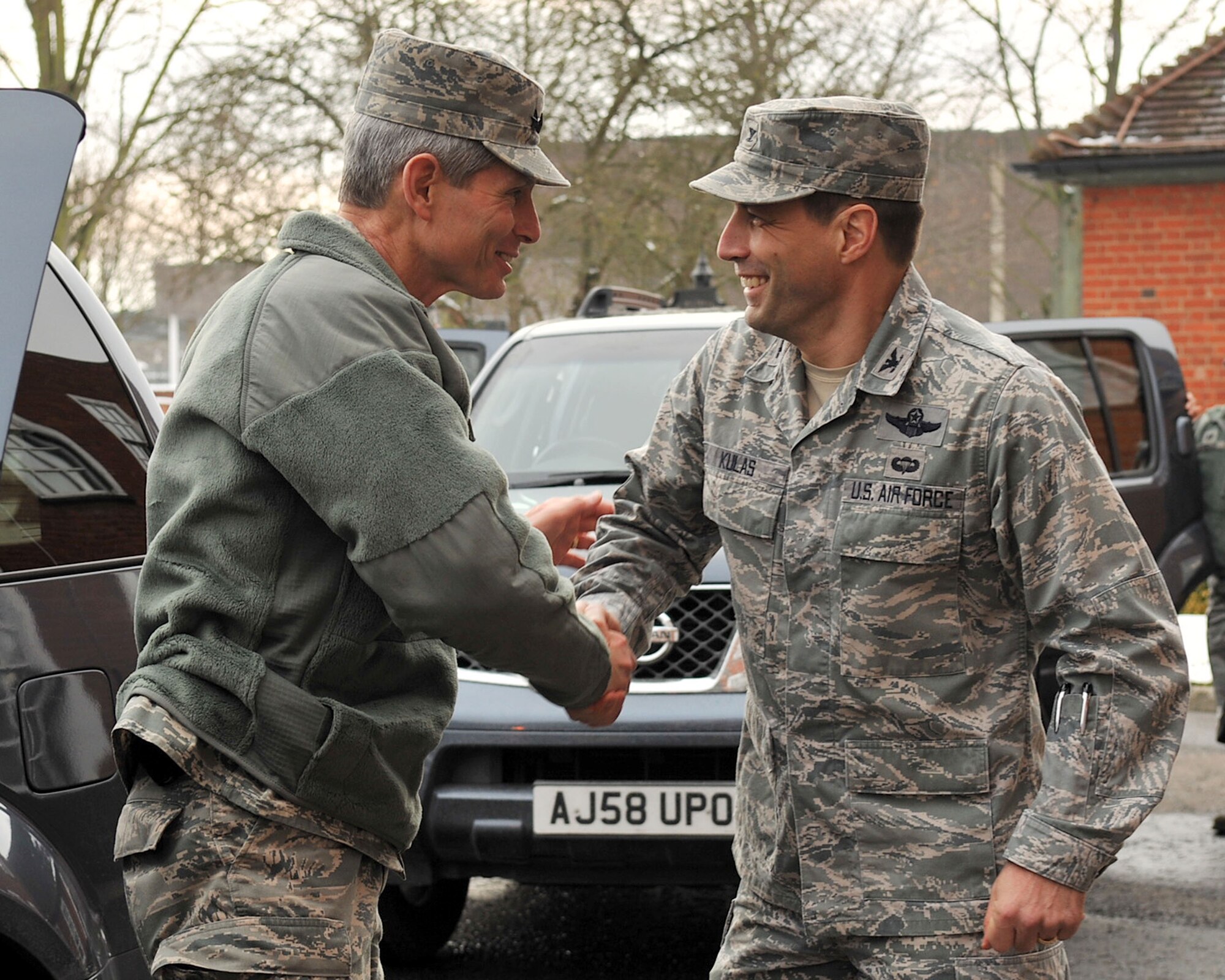 RAF MILDENHALL, England - Col. Christopher Kulas, 100th Air Refueling Wing commander, greets Air Force Chief of Staff Gen. Norton Schwartz during a visit to RAF Mildenhall Feb. 10, 2012. Schwartz briefly toured the base, as well as RAF Lakenheath, and served as guest speaker at both annual awards ceremonies. (U.S. Air Force photo/Senior Airman Jerilyn Quintanilla)
