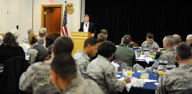 WHITEMAN AIR FORCE BASE, Mo. -- Guest speaker Minister John C. Majors speaks to the Whiteman team during the annual National Prayer Breakfast Feb. 7. The breakfast is designed to be a forum for political, social, and business leaders of the world to assemble together and build relationships in the spirit of Jesus Christ which might not otherwise be possible. The tradition has taken place since 1953. (U.S. Air Force photo by Senior Airman Laura Goodgame) 