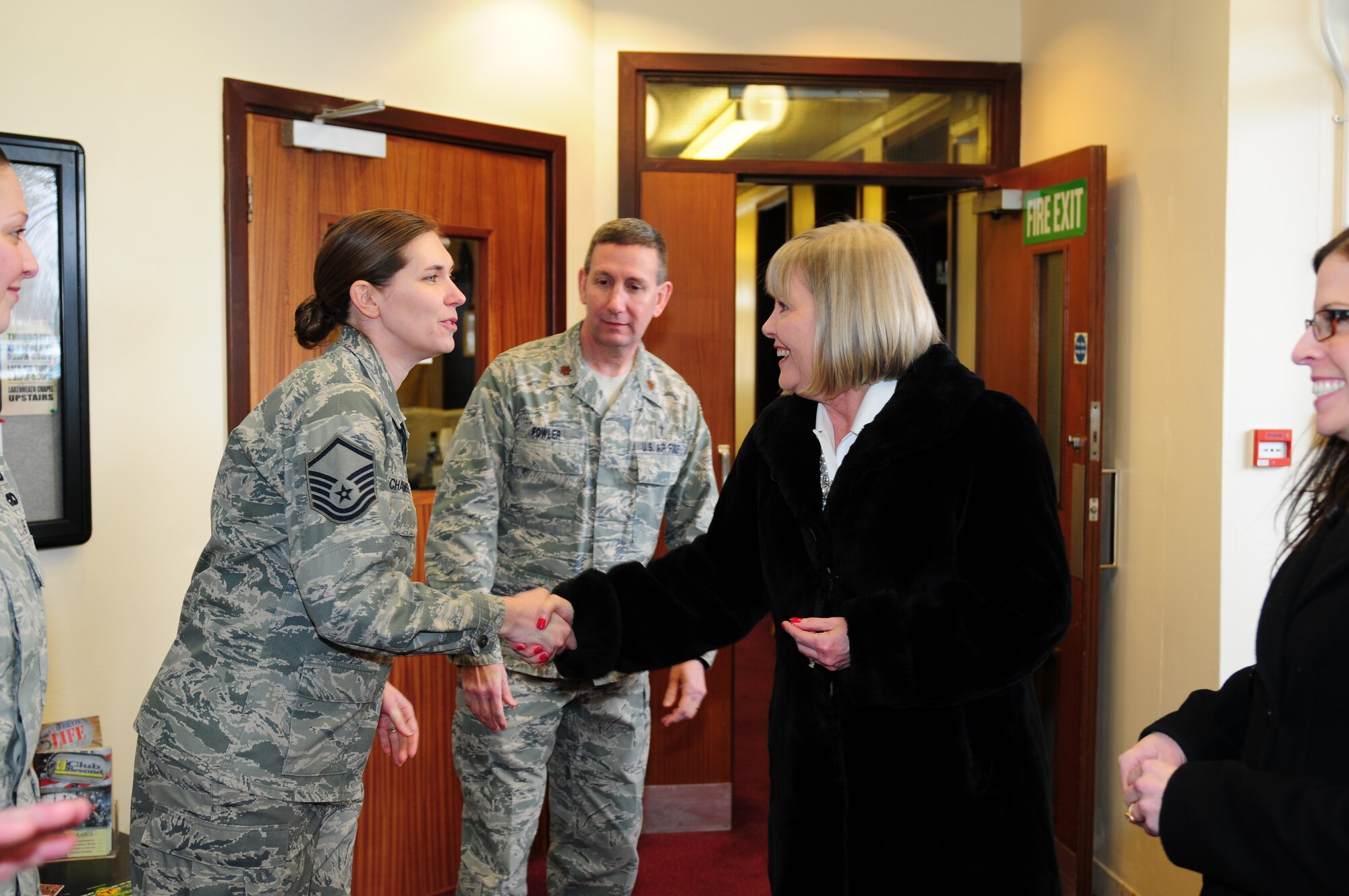 ROYAL AIR FORCE LAKENHEATH, England – Master Sgt. Sadie Chambers, 48th Fighter Wing superintendant of chaplain operations, greets Suzie Schwartz, wife of Air Force Chief of Staff Gen. Norton Schwartz, before meeting with the RAF Lakenheath Key Spouses Feb. 10, 2012.  Mrs. Schwartz recognized the entire RAF Lakenheath Key Spouses for their hard work as and presented Sharon Ledbetter with the Key Spouse of the Year award. (U.S. Air Force photo by Airman 1st Class Cory D. Payne)