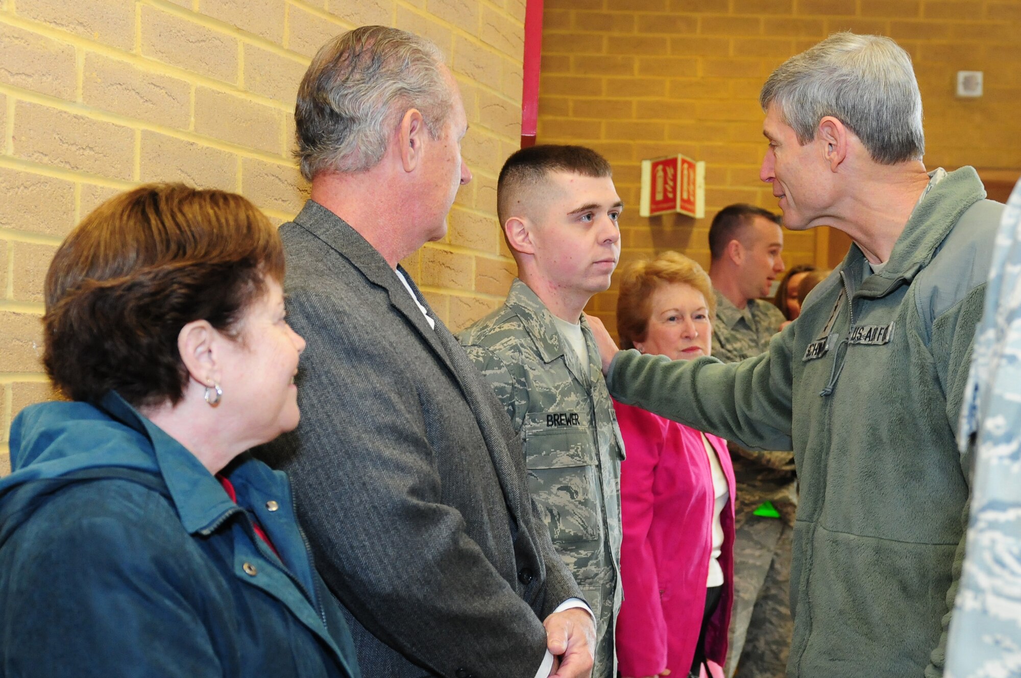 ROYAL AIR FORCE LAKENHEATH, England -- Air Force Chief of Staff Gen. Norton Schwartz, greets Staff Sgt. Trevor Brewer, 48th Security Forces Squadron NCO in charge of vehicles, prior to an awards presentation at the Strike Eagle Complex Feb. 10, 2012. Brewer, along with three other security forces Airmen were, presented medals for their assertiveness and courageous actions during the shooting at Frankfurt International Airport, Germany in March 2011. (U.S. Air Force photo by Senior Airman Lausanne Morgan)